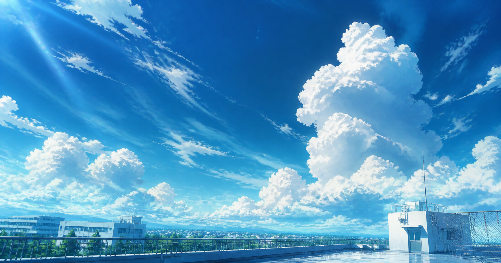 夏空にわく積雲と校舎の屋上