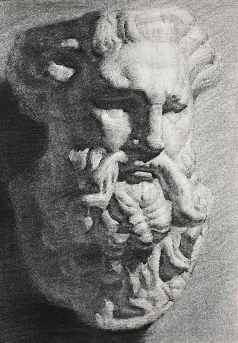 Completed graphite drawing: the fragmentary marble head fully rendered with carved curls, deep-set eyes and a heavy braided beard.