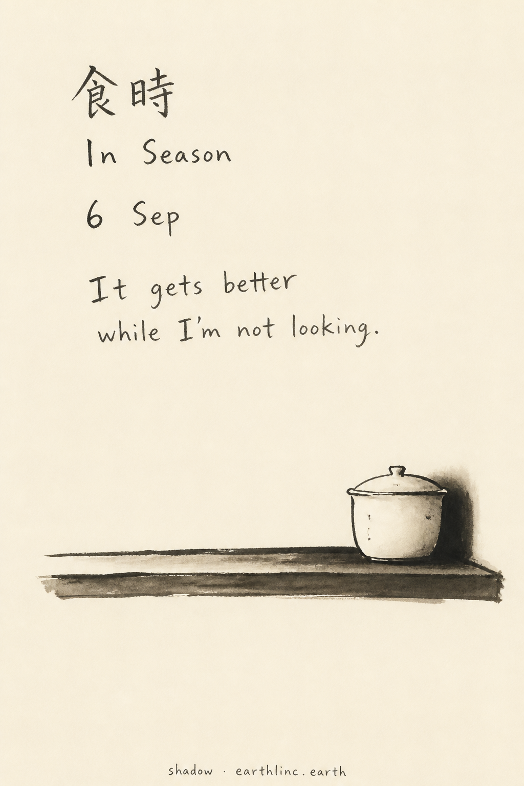 One tub pushed to the back of a dark shelf — near-empty ink composition